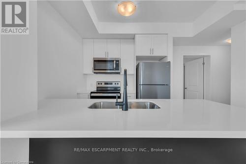 406 - 460 Dundas Street E, Hamilton, ON - Indoor Photo Showing Kitchen With Stainless Steel Kitchen With Double Sink With Upgraded Kitchen