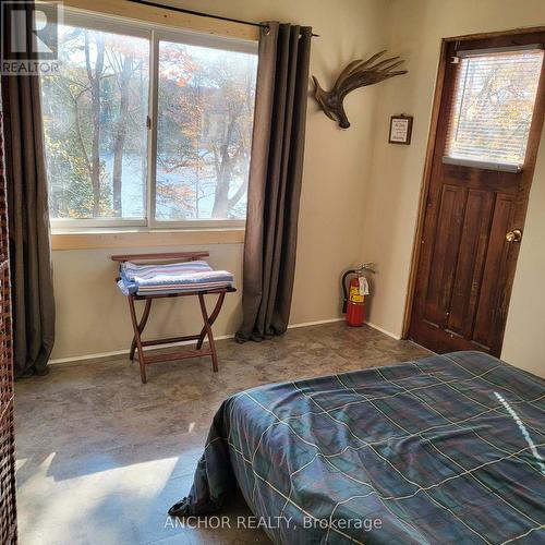 Bunkie - 550 Shawanaga Lake, Mcdougall, ON - Indoor Photo Showing Bedroom