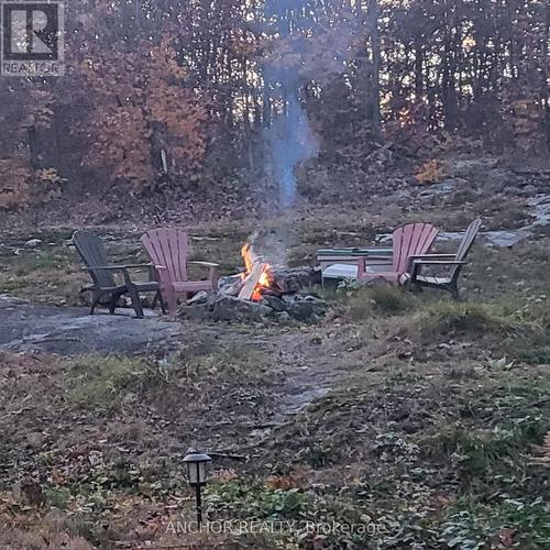 Main Cabin Fire  pit - 550 Shawanaga Lake, Mcdougall, ON - Outdoor With View