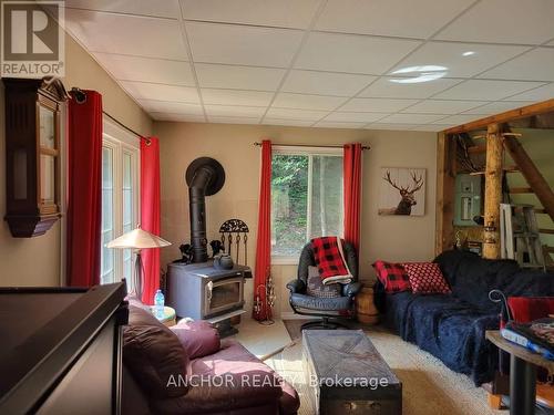 Main Cabin Living Room - 550 Shawanaga Lake, Mcdougall, ON - Indoor Photo Showing Other Room