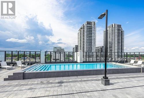 302 - 36 Zorra Street, Toronto, ON - Outdoor With In Ground Pool