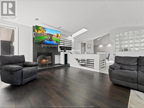 2576 Rossini, Windsor, ON - Indoor Photo Showing Living Room With Fireplace