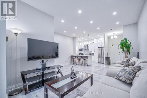 108 - 3605 Kariya Drive, Mississauga, ON - Indoor Photo Showing Living Room