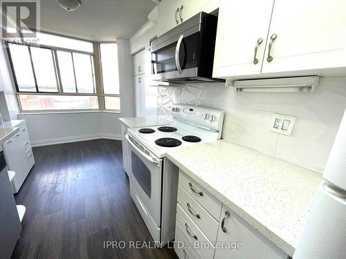 706 - 100 County Court Boulevard, Brampton, ON - Indoor Photo Showing Kitchen