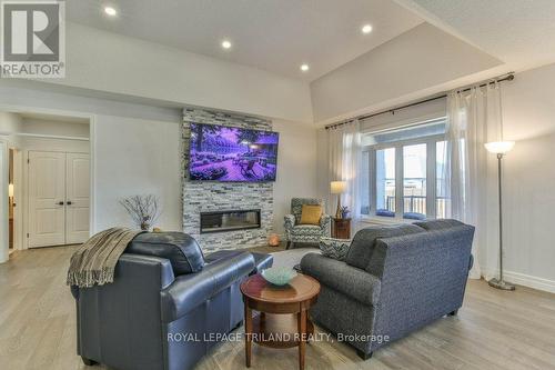 Beautiful Tray Ceiling - 88 Foxborough Place, Thames Centre (Thorndale), ON - Indoor Photo Showing Living Room With Fireplace