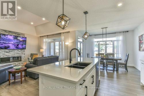 88 Foxborough Place, Thames Centre (Thorndale), ON - Indoor Photo Showing Kitchen With Fireplace With Double Sink