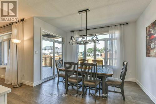 Formal Dining with Access to Rear Covered Deck - 88 Foxborough Place, Thames Centre (Thorndale), ON - Indoor Photo Showing Dining Room