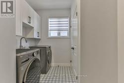 Main Floor Laundry Room and Storage - 