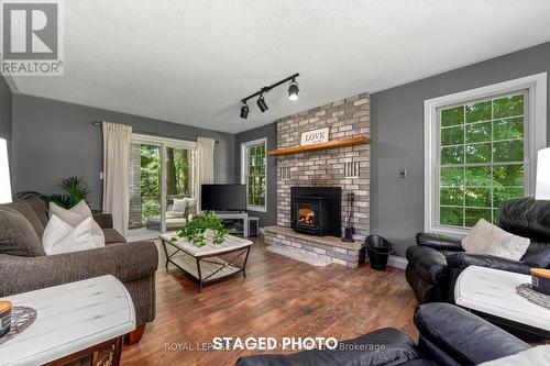 26 Smith Road, Belleville, ON - Indoor Photo Showing Living Room With Fireplace