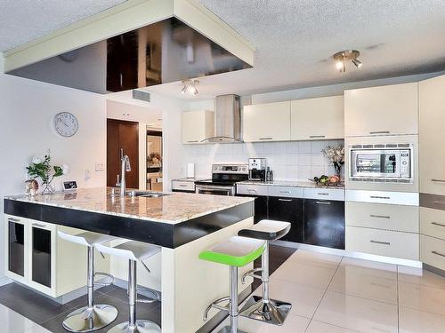 Cuisine - 307-8145 Boul. St-Laurent, Brossard, QC - Indoor Photo Showing Kitchen With Upgraded Kitchen