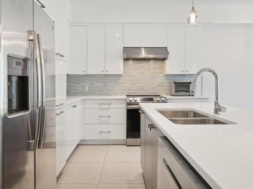 Cuisine - 4092 Rue Cartier, Montréal (Le Plateau-Mont-Royal), QC - Indoor Photo Showing Kitchen With Double Sink With Upgraded Kitchen