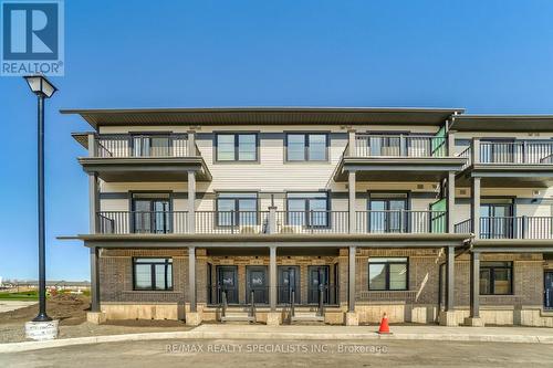 120 Wheat Lane, Kitchener, ON - Outdoor With Balcony With Facade