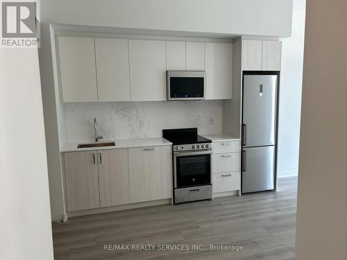 102 - 1787 St Clair Avenue E, Toronto, ON - Indoor Photo Showing Kitchen