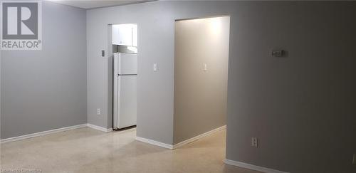 Corridor with light carpet - 76 Brybeck Crescent Unit# 105, Kitchener, ON - Indoor Photo Showing Other Room