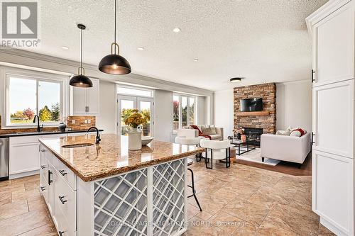 13 Dance Street, Collingwood, ON - Indoor Photo Showing Kitchen With Fireplace With Upgraded Kitchen