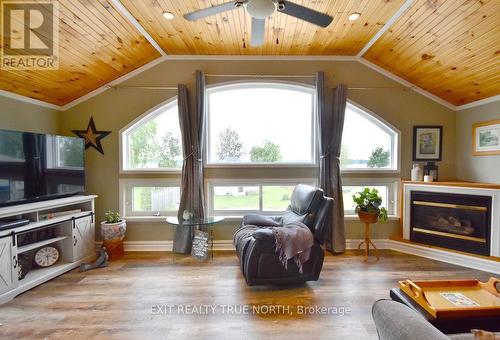 5632 Penetanguishene Road, Springwater, ON - Indoor Photo Showing Living Room With Fireplace