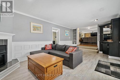 25 Edgewater Drive, Smith-Ennismore-Lakefield, ON - Indoor Photo Showing Living Room With Fireplace