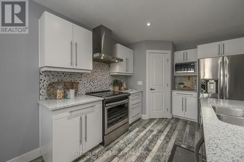 17 - 38 Elliott Trail, Thames Centre (Thorndale), ON - Indoor Photo Showing Kitchen With Double Sink With Upgraded Kitchen