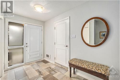 Spacious entrance foyer with inside access to a large garage - 655 Richmond Road Unit#34, Ottawa, ON - Indoor Photo Showing Other Room