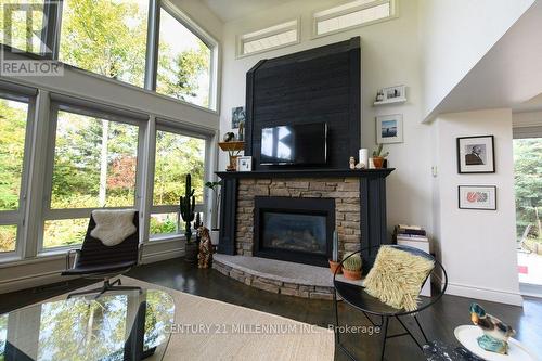 3 Simcoe Street, Wasaga Beach, ON - Indoor Photo Showing Living Room With Fireplace