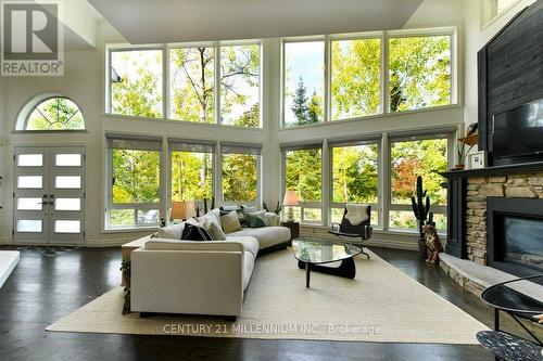 3 Simcoe Street, Wasaga Beach, ON - Indoor Photo Showing Living Room With Fireplace