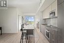 609 - 220 Missinnihe Way, Mississauga, ON  - Indoor Photo Showing Kitchen With Upgraded Kitchen 