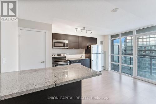 1801 - 38 Joe Shuster Way, Toronto, ON - Indoor Photo Showing Kitchen