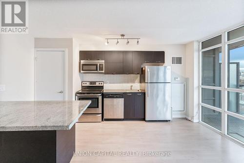 1801 - 38 Joe Shuster Way, Toronto, ON - Indoor Photo Showing Kitchen