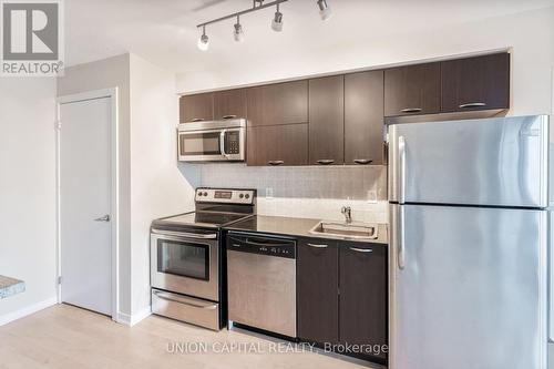 1801 - 38 Joe Shuster Way, Toronto, ON - Indoor Photo Showing Kitchen