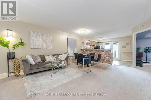 305 - 1380 Main Street E, Milton, ON - Indoor Photo Showing Living Room