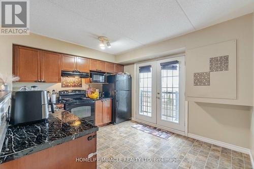 305 - 1380 Main Street E, Milton, ON - Indoor Photo Showing Kitchen