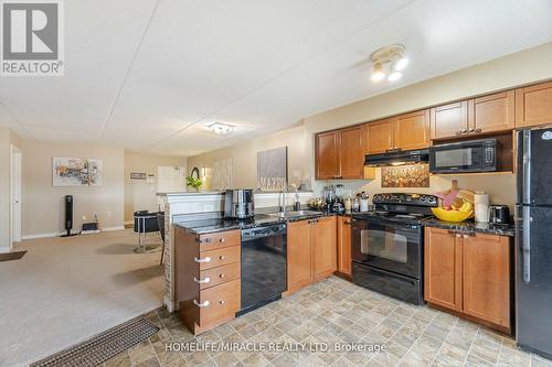 305 - 1380 Main Street E, Milton, ON - Indoor Photo Showing Kitchen