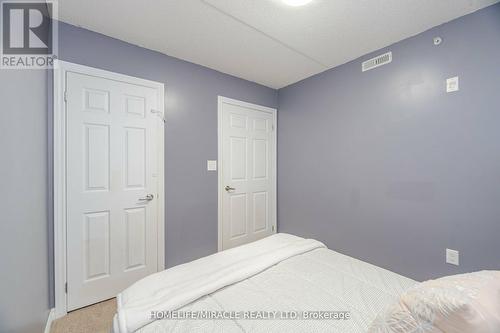 305 - 1380 Main Street E, Milton, ON - Indoor Photo Showing Bedroom