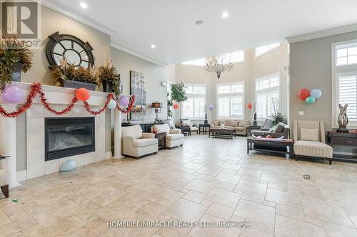 305 - 1380 Main Street E, Milton, ON - Indoor Photo Showing Living Room With Fireplace