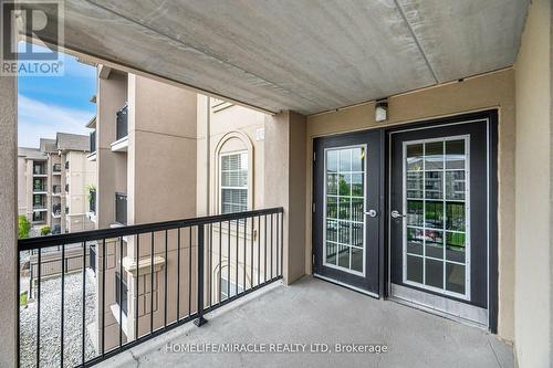 305 - 1380 Main Street E, Milton, ON - Outdoor With Balcony With Exterior