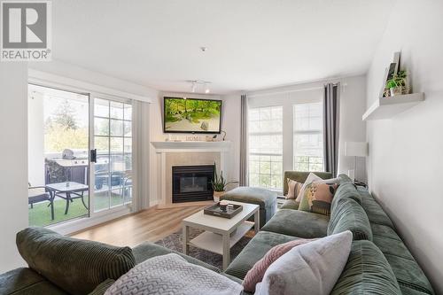 308 1655 Grant Avenue, Port Coquitlam, BC - Indoor Photo Showing Living Room With Fireplace