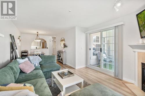 308 1655 Grant Avenue, Port Coquitlam, BC - Indoor Photo Showing Living Room With Fireplace