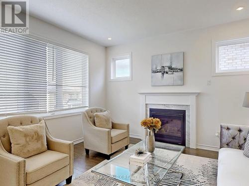 51 Gould Crescent, New Tecumseth, ON - Indoor Photo Showing Living Room With Fireplace