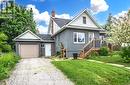 1556 Flos Rd 4 W, Springwater, ON  - Outdoor With Facade 