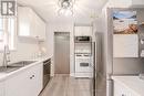 1556 Flos Rd 4 W, Springwater, ON  - Indoor Photo Showing Kitchen With Double Sink 