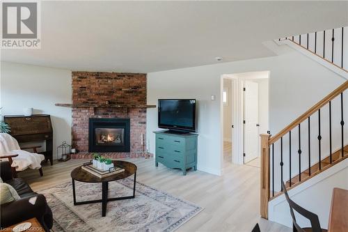 675 Orchard Drive, Port Elgin, ON - Indoor Photo Showing Living Room With Fireplace