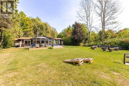 Huge lakefront yard offers lots of rec space - 85417A Mcdonald Lane, Ashfield-Colborne-Wawanosh (Ashfield Twp), ON - Outdoor With Deck Patio Veranda