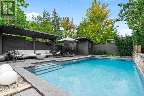 235 Bessborough Drive, Toronto, ON - Outdoor With In Ground Pool With Backyard