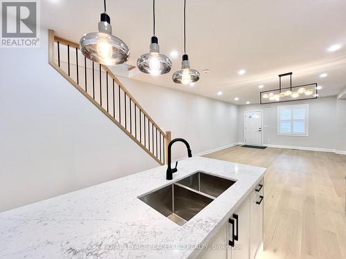 73 Merrill Avenue E, Toronto, ON - Indoor Photo Showing Kitchen With Double Sink