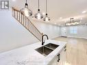 73 Merrill Avenue E, Toronto, ON  - Indoor Photo Showing Kitchen With Double Sink 