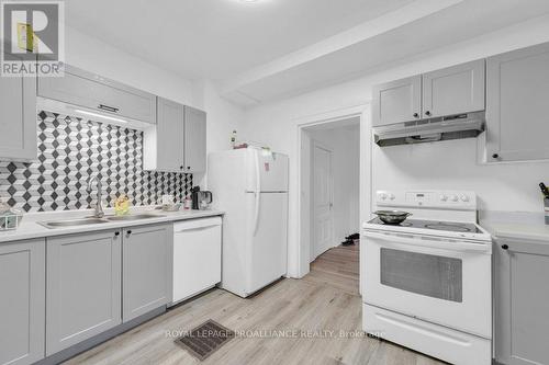 91 Bridge Street W, Belleville, ON - Indoor Photo Showing Kitchen With Double Sink