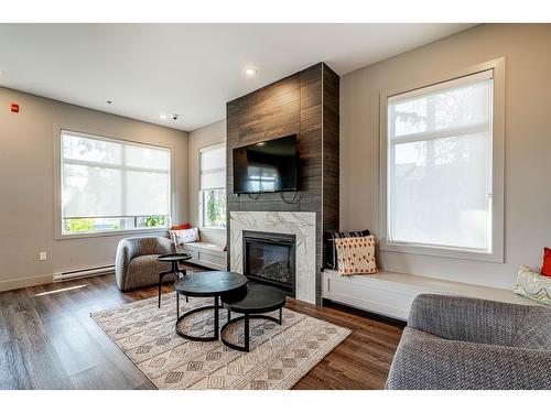 170 9718 161A Street, Surrey, BC - Indoor Photo Showing Living Room With Fireplace