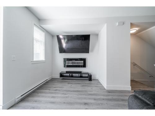 170 9718 161A Street, Surrey, BC - Indoor With Fireplace