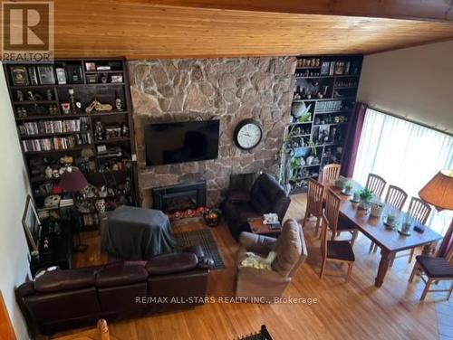 1007 Dewey Street, Highlands East, ON - Indoor Photo Showing Other Room With Fireplace