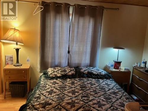 1007 Dewey Street, Highlands East, ON - Indoor Photo Showing Bedroom